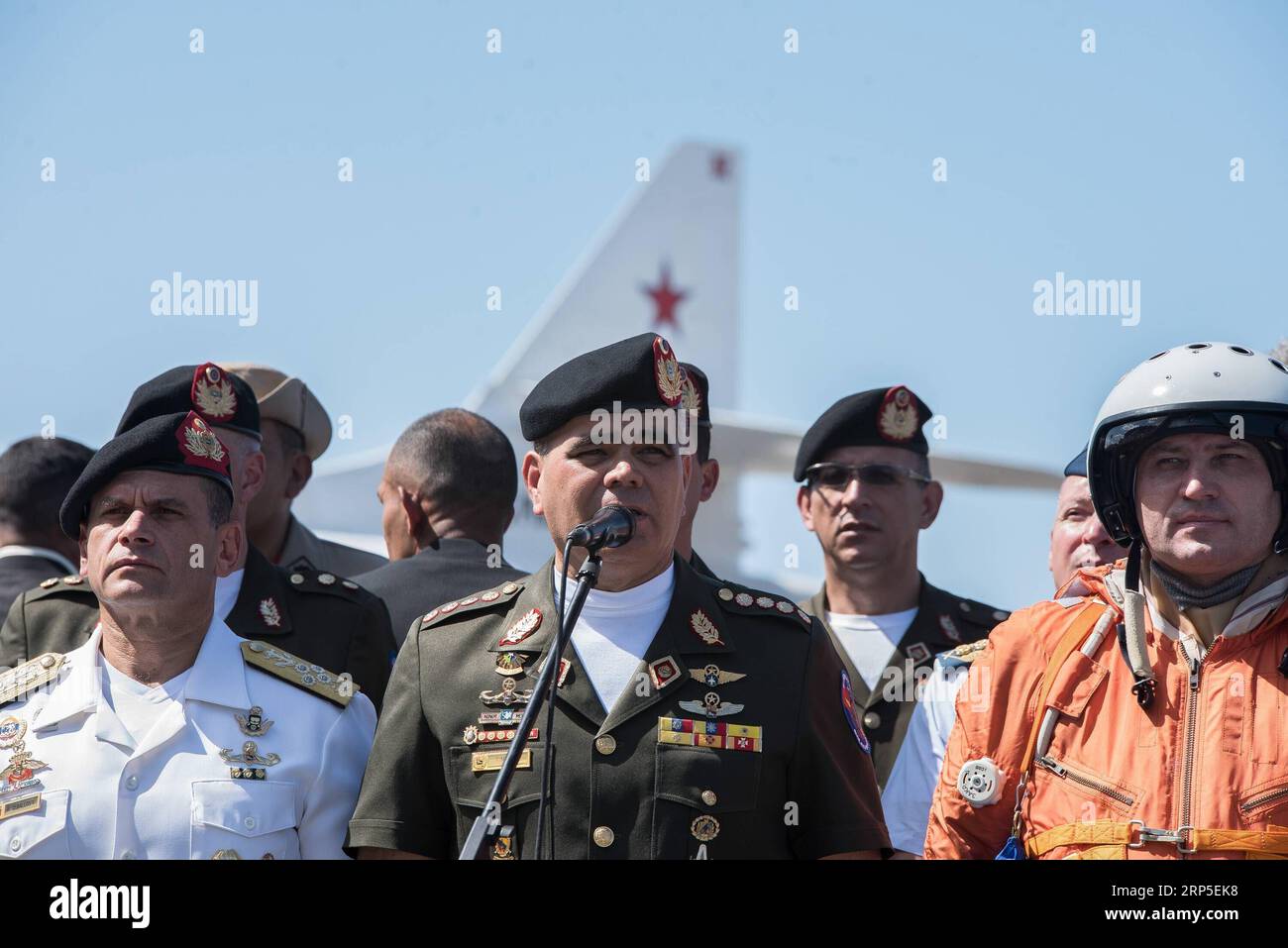 (181212) -- VARGAS, Dec. 12, 2018 -- Venezuelan Defense Minister Vladimir Padrino Lopez delivers a speech during the reception ceremony for the Russian Armed Forces at the Simon Bolivar International Airport, in Maiquetia, Vargas State, Venezuela, Dec. 10, 2018. Two Russian Tupolev Tu-160 strategic bombers have arrived in Venezuela, the Russian defense ministry said in a statement. According to Russian news report, Venezuelan Defense Minister Vladimir Padrino Lopez welcomed the Russian warplanes, saying that Venezuela is getting prepared to defend itself when needed and the country will do it Stock Photo