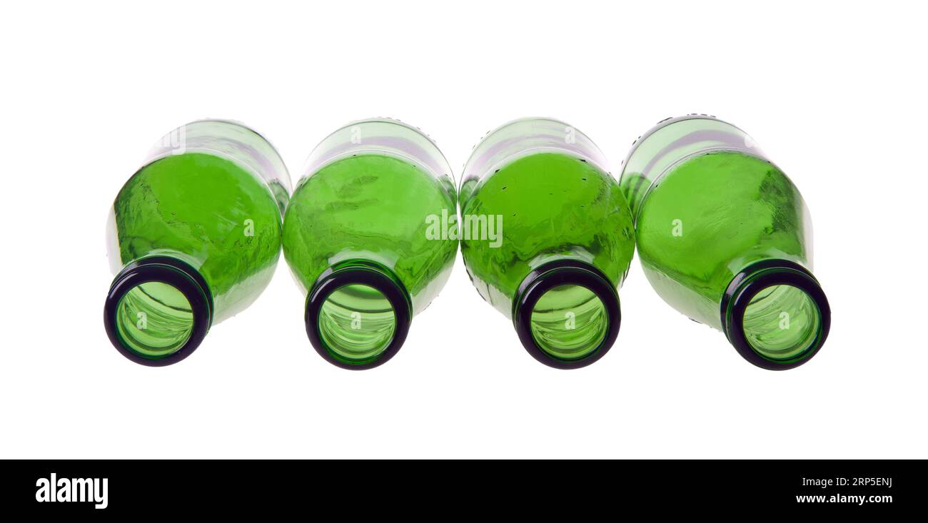 Green glass bottles isolated on a white background Stock Photo - Alamy