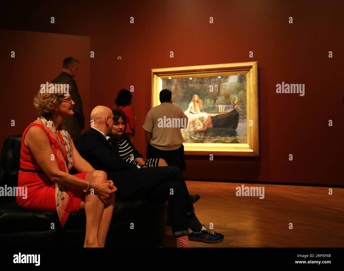(181213) -- CANBERRA, Dec. 13, 2018 -- People view The Lady of Shalott at the National Gallery of Australia (NGA) in Canberra, Australia, Dec. 12, 2018. For the first time paintings The Lady of Shalott and Ophelia left Britain for Australia, as an exhibition named Love and Desire: Pre-Raphaelite Masterpieces from the Tate , will open to the public in the NGA on Friday. ) (wyo) AUSTRALIA-CANBERRA-EXHIBITION-BRITISH MASTERPIECES PanxXiangyue PUBLICATIONxNOTxINxCHN Stock Photo