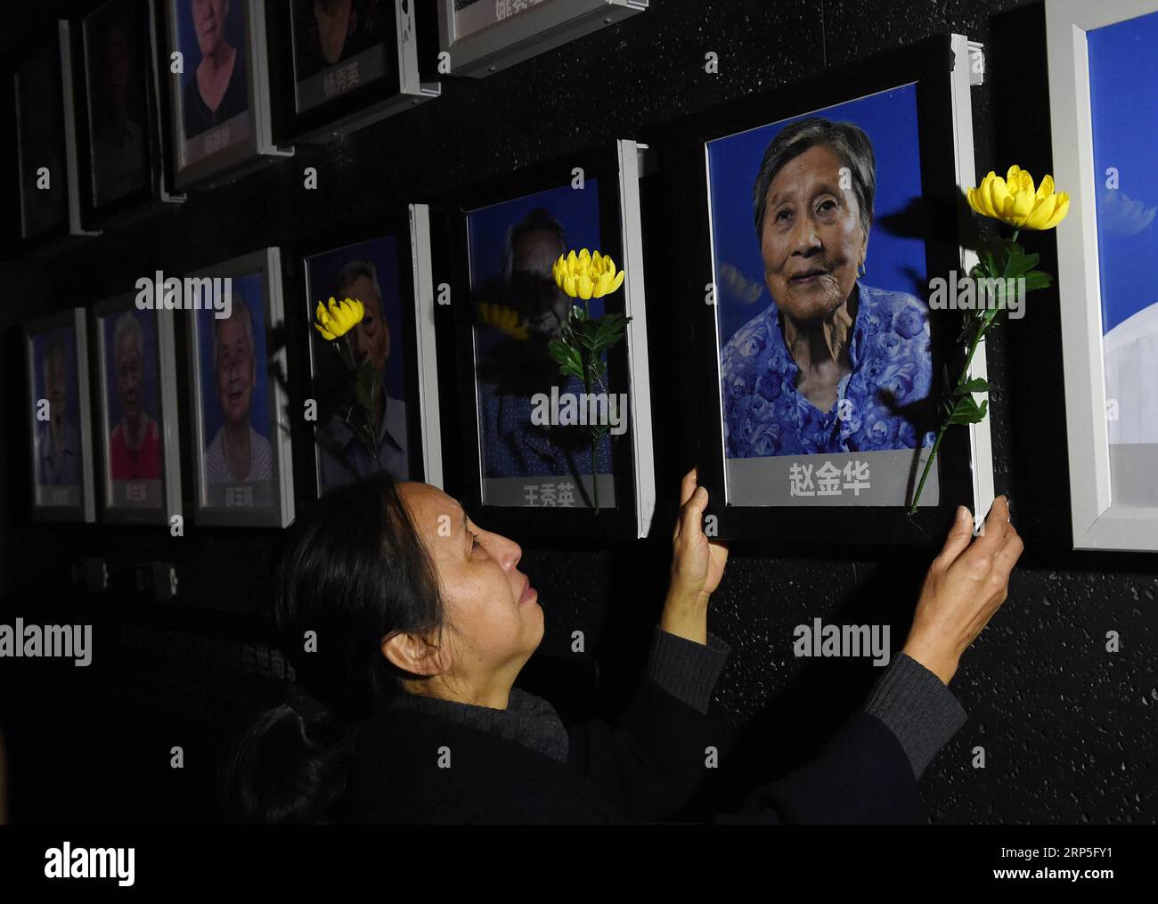 (181213) -- BEIJING, Dec. 13, 2018 -- Zhao Min, daughter of the late Nanjing Massacre survivor Zhao Jinhua, mourns her mother s passing at the Memorial Hall of the Victims in Nanjing Massacre by Japanese Invaders in Nanjing, capital of east China s Jiangsu Province, Dec. 6, 2018. ) Xinhua Headlines: China observes national memorial day with praying for peace SunxCan PUBLICATIONxNOTxINxCHN Stock Photo