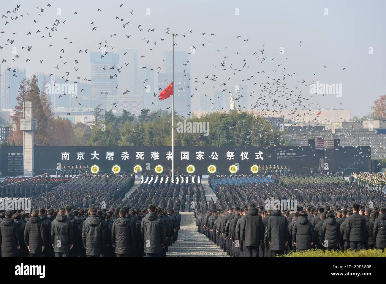 (181213) -- BEIJING, Dec. 13, 2018 -- Photo taken on Dec. 13, 2018 shows pigeons flying during the state memorial ceremony for China s National Memorial Day for Nanjing Massacre Victims at the memorial hall for the massacre victims in Nanjing, east China s Jiangsu Province. ) Xinhua Headlines: China observes national memorial day with praying for peace JixChunpeng PUBLICATIONxNOTxINxCHN Stock Photo