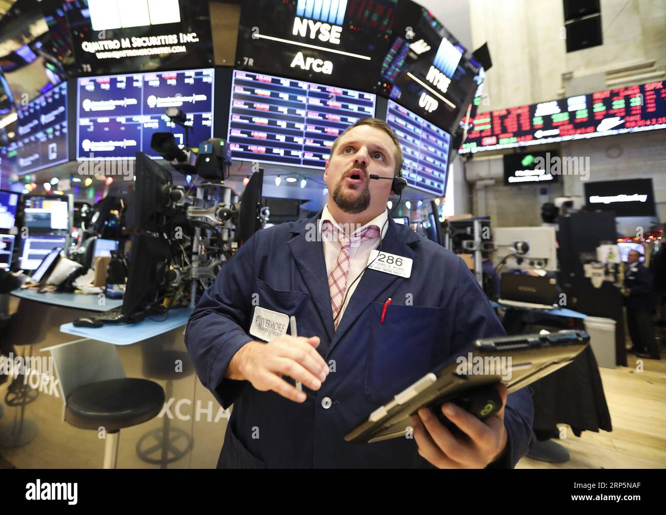 (181219) -- NEW YORK, Dec. 19, 2018 -- A trader works at the New York Stock Exchange in New York, the United States, on Dec. 19, 2018. U.S. stocks ended lower on Wednesday. The Dow fell 1.49 percent to 23,323.66, and the S&P 500 decreased 1.54 percent to 2,506.96, while the Nasdaq was down 2.17 percent to 6,636.83. ) U.S.-NEW YORK-STOCKS WangxYing PUBLICATIONxNOTxINxCHN Stock Photo
