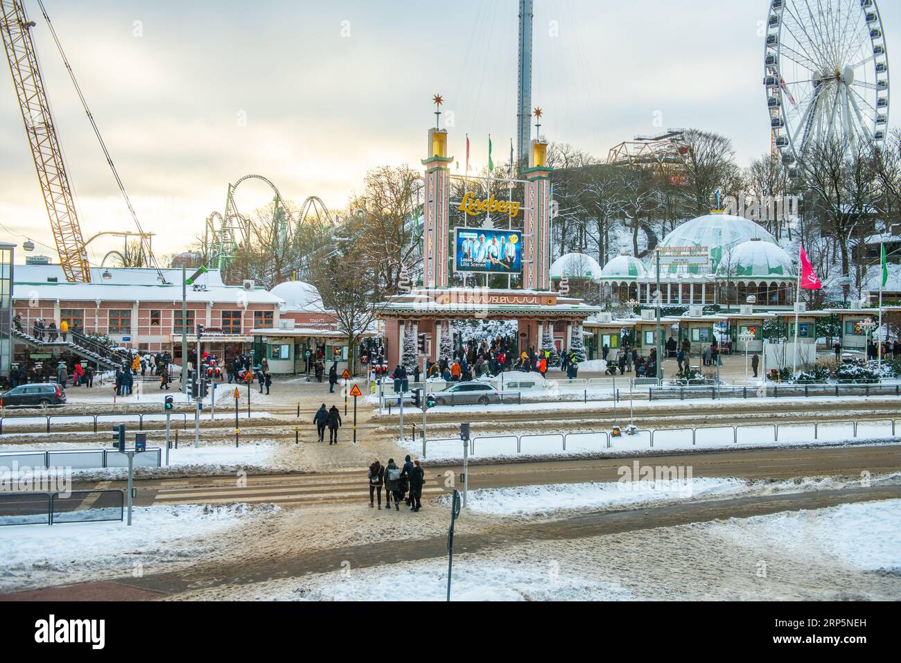 Gothenburg, Sweden - december 05 2021: People queuing by the northern entrance of Liseberg amusement park Stock Photo