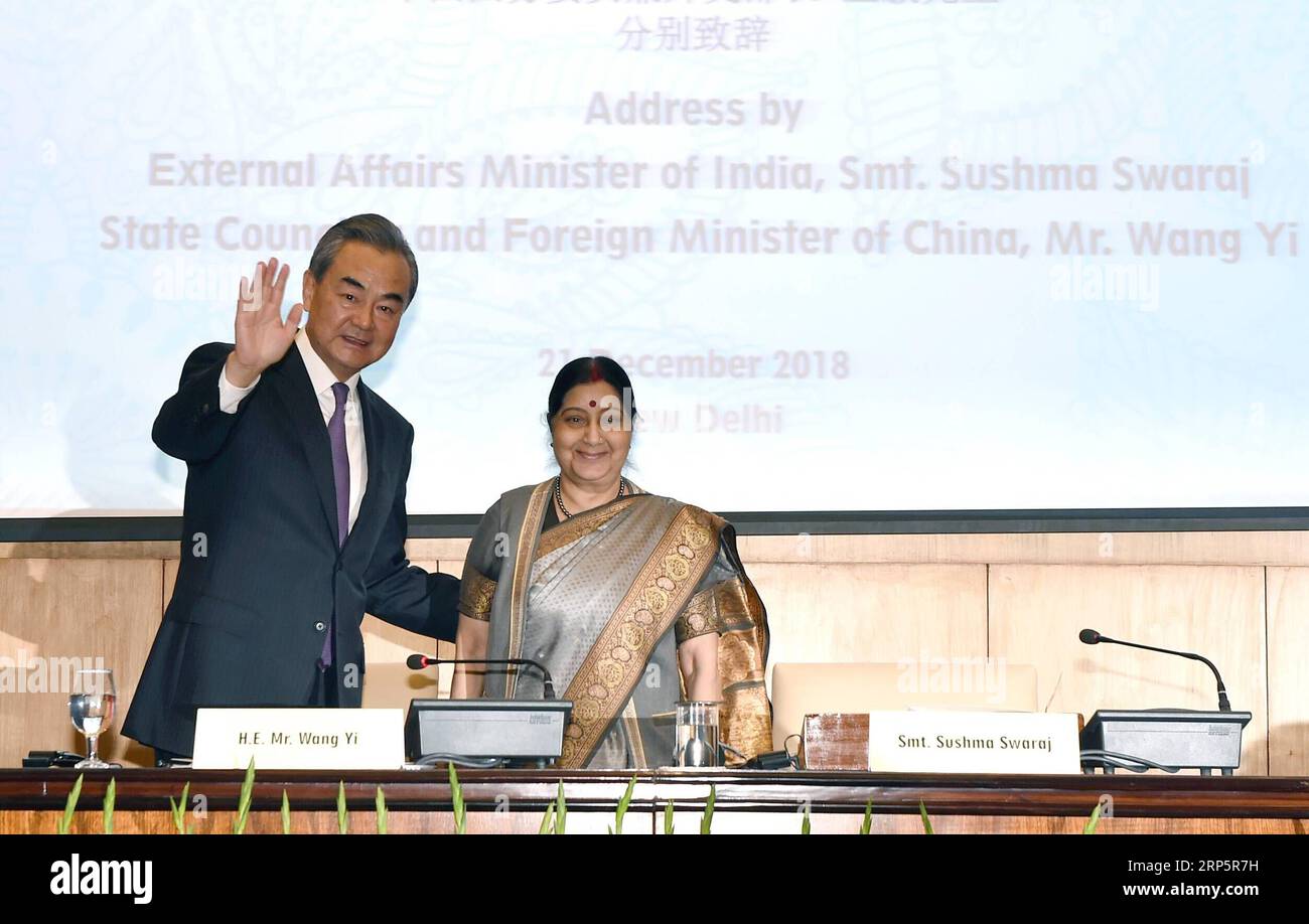 (181221) -- NEW DELHI, Dec. 21, 2018 -- Chinese State Councilor and Foreign Minister Wang Yi (L) and Indian External Affairs Minister Sushma Swaraj co-chair the first meeting of the China-India high-level people to people exchanges mechanism, in New Delhi, India, Dec. 21, 2018. China and India said here Friday that establishing the China-India high-level people to people exchanges mechanism is an important measure to develop the all-round bilateral relations between the two countries. ) INDIA-NEW DELHI-CHINA-WANG YI-PEOPLE TO PEOPLE EXCHANGES MECHANISM-MEETING ZhangxNaijie PUBLICATIONxNOTxINxC Stock Photo