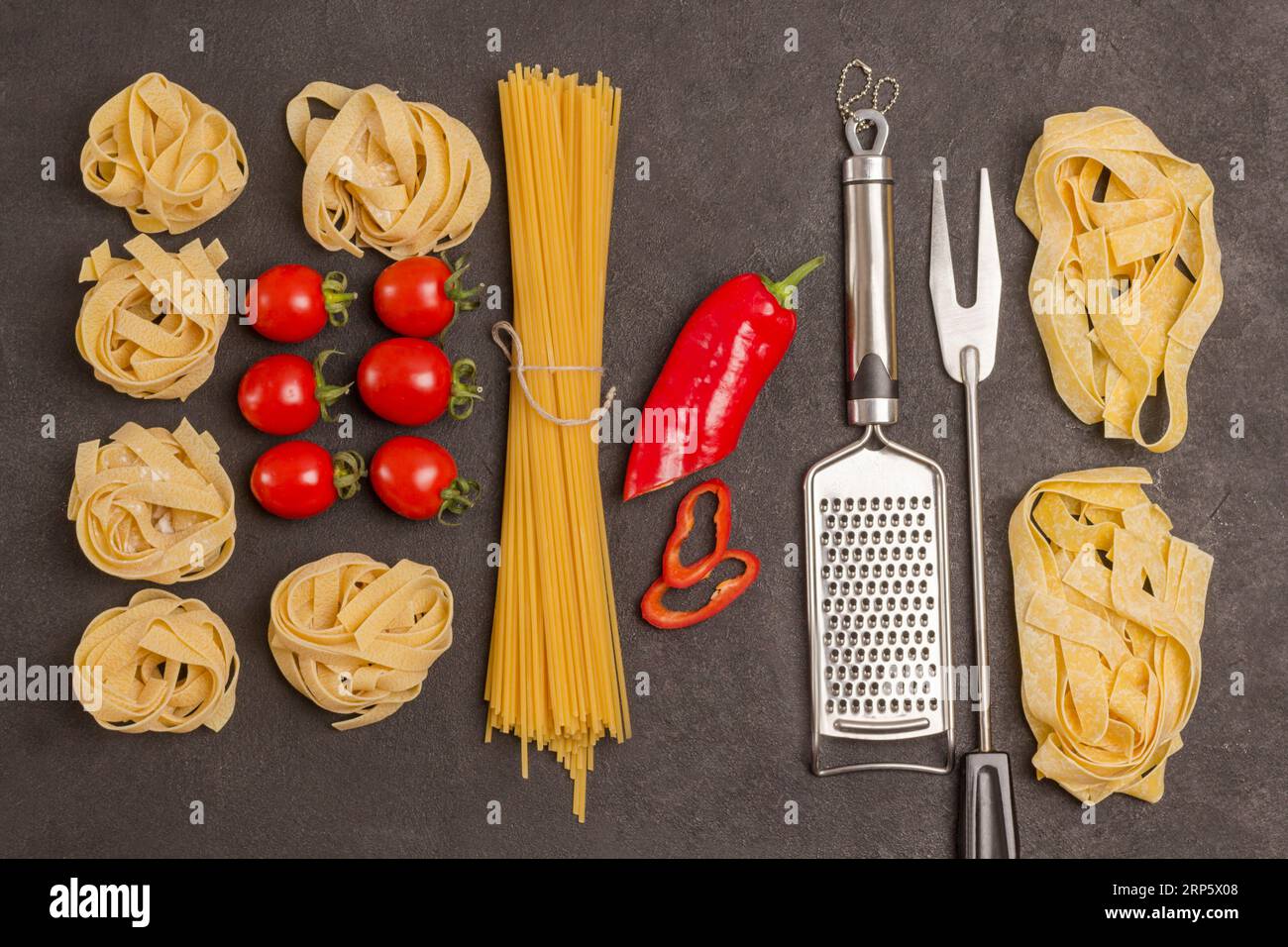 Organic food on black background. Variety of types and shapes of dry