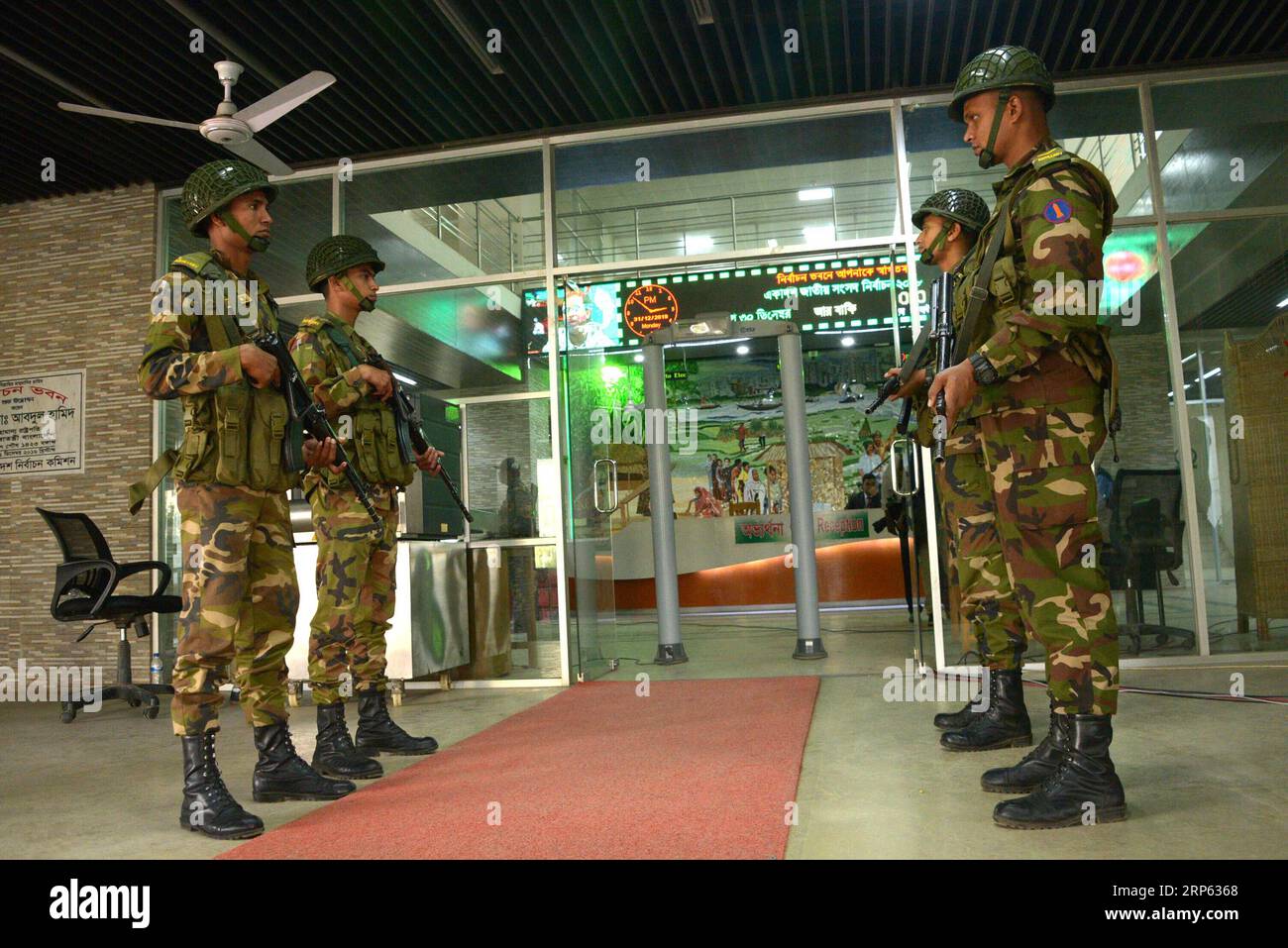 (181231) -- DHAKA, Dec. 31, 2018 -- Army soldiers stand guard at Election Commission office in Dhaka, capital of Bangladesh, Dec. 31, 2018. At a press conference in Dhaka Monday, Chief Election Commissioner KM Nurul Huda ruled out the opposition alliance s demand for holding reelection and rejected the allegation of widespread irregularities in the country s parliament polls held on Sunday. BANGLADESH-DHAKA-ELECTION-COMMISSION Naim-ul-karim PUBLICATIONxNOTxINxCHN Stock Photo