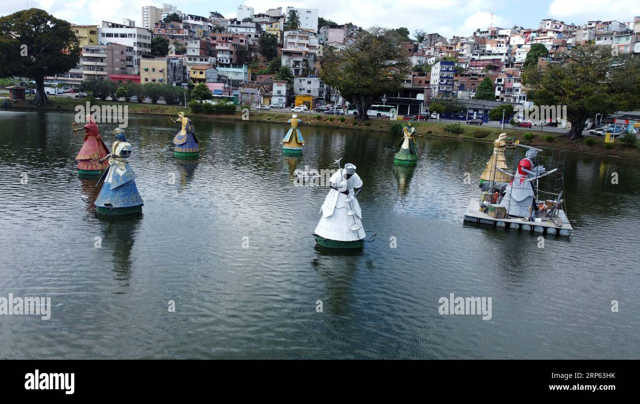 salvador, bahia, brazil - august 2, 2022: view of the lake from Dique de Itororo and sculpture of orixas, Candomble entities. Stock Photo