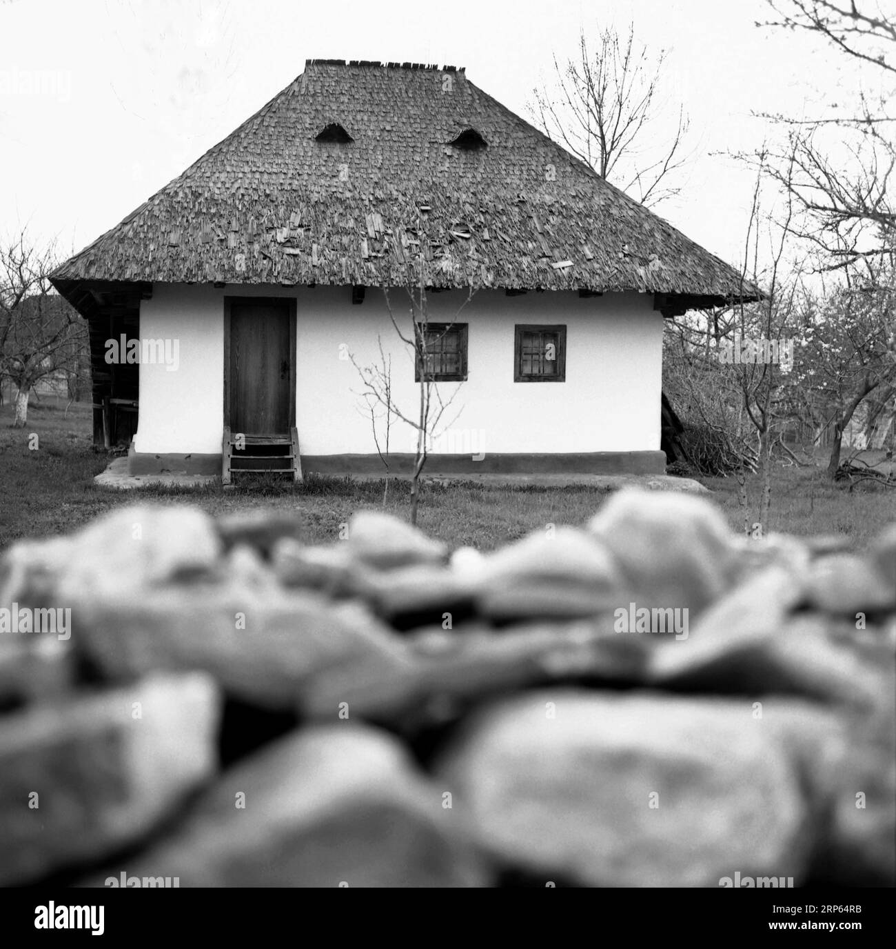 Traditional Ronta House Frame Simple traditional old house with wooden shingles roof in Romania ...