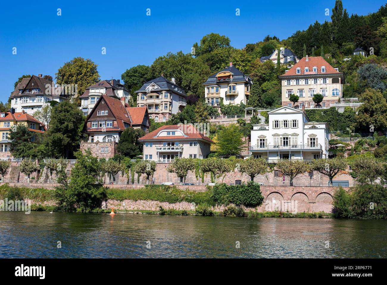 Residential area near the old, famous city of Heidelberg, Germany. View of beautiful houses. Cottages on the river bank. Beautiful nature around. Mode Stock Photo