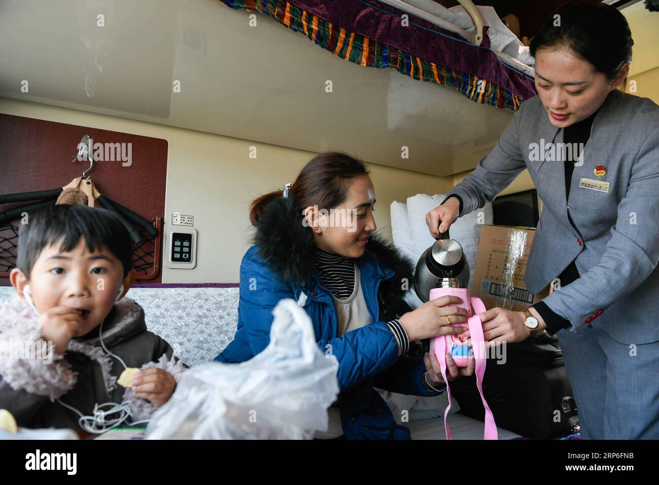 Chinese train conductor hi-res stock photography and images