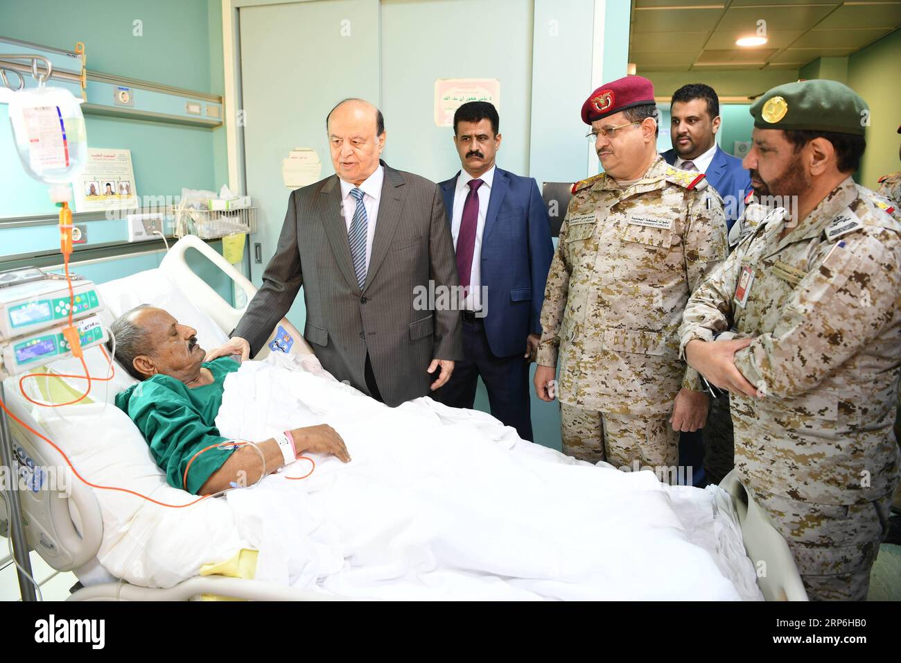 (190113) -- RIYADH, Jan. 13, 2019 -- Yemen s internationally-backed President Abdu-Rabbu Mansour Hadi (2nd L) visits Director of the country s Military College Abdulkaream Azowmahi who is receiving treatment at a military hospital in Saudi Arabia s capital Riyadh, Jan. 13, 2019. Abdu-Rabbu Mansour Hadi paid a visit on Sunday to a hospital in Saudi Arabia to inspect health conditions of officials injured by a Houthi drone strike in southern Lahj province three days ago. SAUDI ARABIA-RIYADH-YEMENI PRESIDENT-INJURED OFFICIALS-VISIT NiexYunpeng PUBLICATIONxNOTxINxCHN Stock Photo