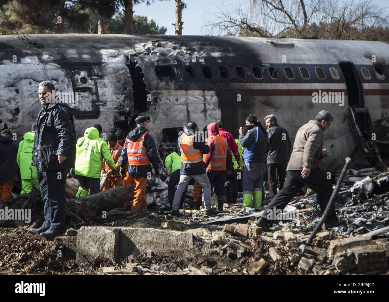 (190114) -- KARAJ, Jan. 14, 2019 -- Rescuers work at the site of a Boeing 707 plane crash in Karaj, Iran, Jan. 14, 2019. At least 15 people were killed on Monday in the crash. ) IRAN-KARAJ-PLANE CRASH AhmadxHalabisaz PUBLICATIONxNOTxINxCHN Stock Photo