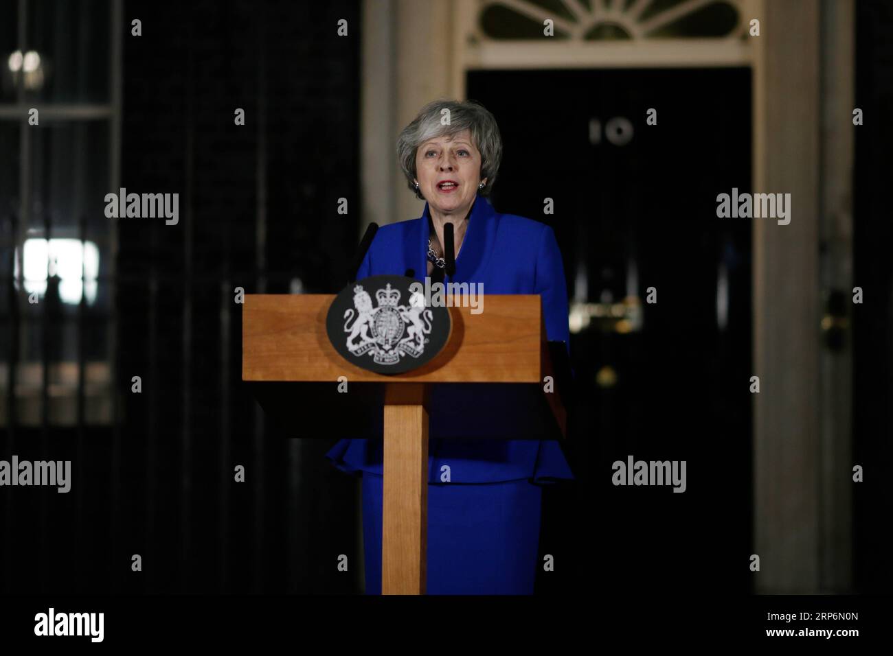 (190117) -- LONDON, Jan. 17, 2019 -- British Prime Minister Theresa May makes a statement outside 10 Downing street, in London, Britain on Jan. 16, 2019. The British government survived a no-confidence vote at the parliament on Wednesday, one day after it suffered a record-breaking Brexit deal vote defeat. ) BRITAIN-LONDON-PM-STATEMENT TimxIreland PUBLICATIONxNOTxINxCHN Stock Photo