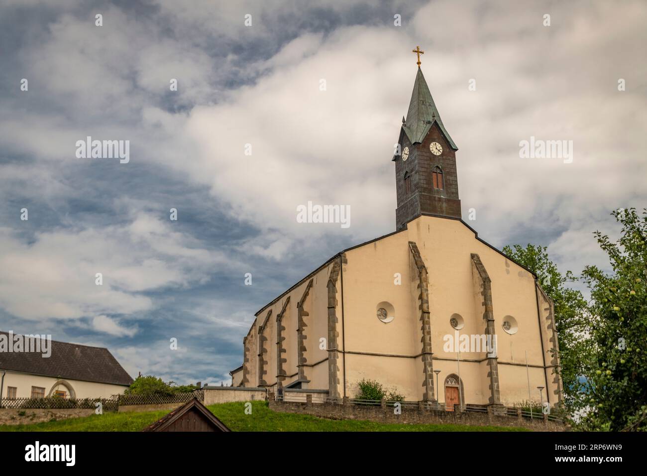 Big color church in Sankt Wolfgang village near Weitra town in Austria summer hot day Stock Photo