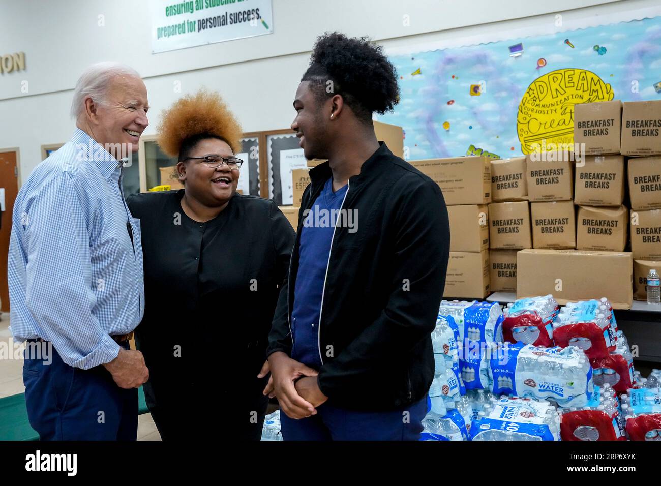 Live Oak, United States. 02nd Sep, 2023. U.S President Joe Biden, left, speaks with volunteers while visiting with victims and emergency management officials in the aftermath of Hurricane Idalia at Suwannee Pineview Elementary School, September 2, 2023 in Live Oak, Florida. Credit: Adam Schultz/White House Photo/Alamy Live News Stock Photo