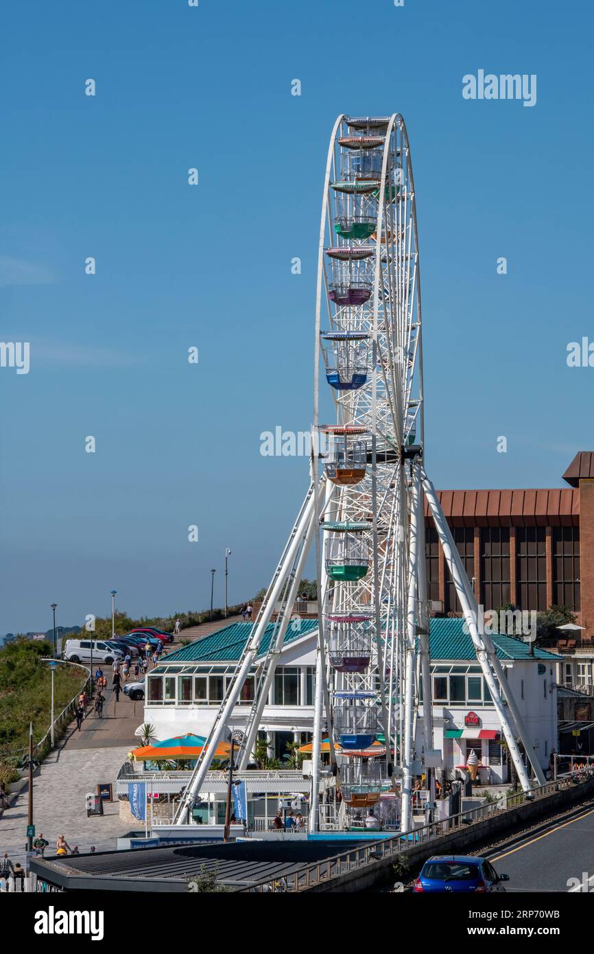large big wheel fairground ride or ferris wheel on the seaside promenade at bournemouth uk Stock Photo