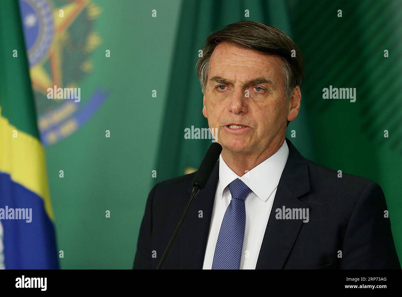 (190126) -- BRASILIA, Jan. 26, 2019 -- Brazil s President Jair Bolsonaro attends a press conference on the collapse of a dam, at Planalto Palace, in Brasilia, capital of Brazil, on Jan. 25, 2019. At least seven people were killed, nine injured and at least 150 others are missing after a tailings dam collapsed Friday afternoon in southeastern state of Minas Gerais, the state government said Friday evening. Ernesto Rodrigues/) BRAZIL-BRASILIA-MINAS GERAIS-DAM-COLLAPSE AGENCIAxESTADO PUBLICATIONxNOTxINxCHN Stock Photo
