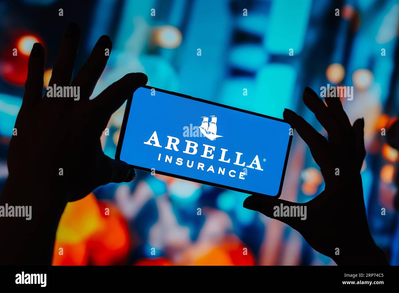 In this photo illustration, the Arbella Mutual Insurance Company logo is displayed on a smartphone screen. Stock Photo
