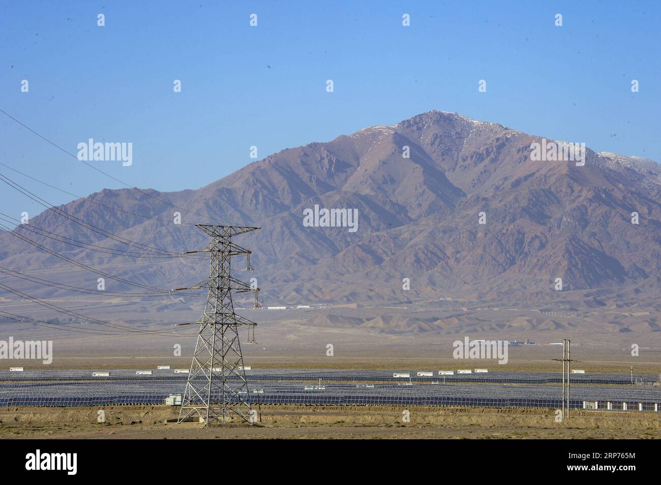 (190129) -- BEIJING, Jan. 29, 2019 (Xinhua) -- Photo taken on Sept. 20, 2018 shows a photovoltaic power plant in Hami, northwest China s Xinjiang Uygur Autonomous Region. New energy power generation saw double digit growth last year in northwest China s Xinjiang Uygur Autonomous Region amid efforts to reduce coal consumption to improve the energy mix. Wind and solar power generation rose 15.2 percent and 13.6 percent to 36 billion kwh and 11.7 billion kwh respectively, according to the regional development and reform commission. It said 22.9 percent of installed wind power generating capacity Stock Photo