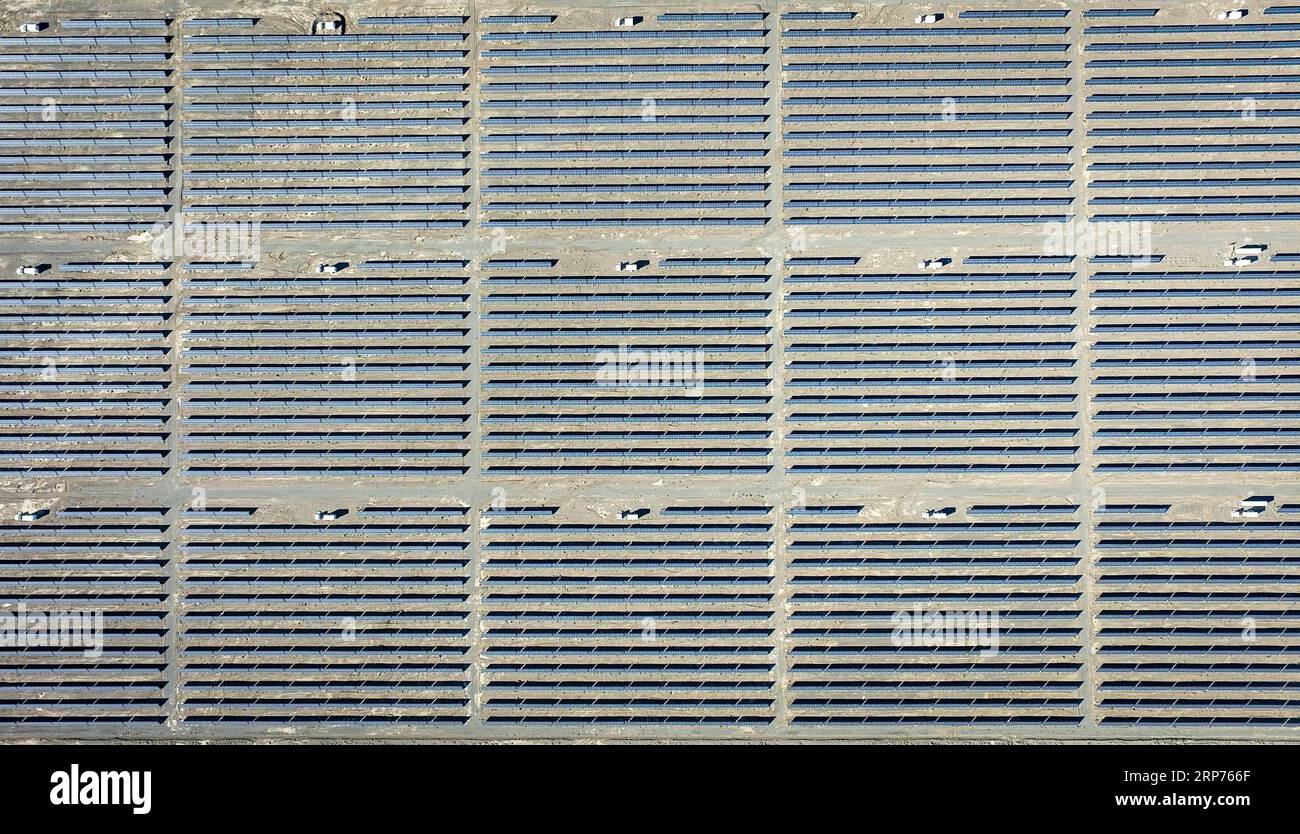 (190129) -- BEIJING, Jan. 29, 2019 (Xinhua) -- Aerial photo taken on Sept. 20, 2018 shows a photovoltaic power plant in Hami, northwest China s Xinjiang Uygur Autonomous Region. New energy power generation saw double digit growth last year in northwest China s Xinjiang Uygur Autonomous Region amid efforts to reduce coal consumption to improve the energy mix. Wind and solar power generation rose 15.2 percent and 13.6 percent to 36 billion kwh and 11.7 billion kwh respectively, according to the regional development and reform commission. It said 22.9 percent of installed wind power generating ca Stock Photo