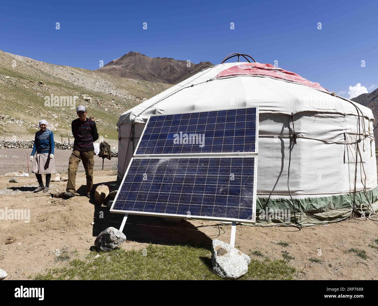 (190129) -- BEIJING, Jan. 29, 2019 (Xinhua) -- A set of solar panels are set up for power supply to the yurt, a movable home for nomads inside the Wakhan Corridor in northwest China s Xinjiang Uygur Autonomous Region, June 6, 2016. New energy power generation saw double digit growth last year in northwest China s Xinjiang Uygur Autonomous Region amid efforts to reduce coal consumption to improve the energy mix. Wind and solar power generation rose 15.2 percent and 13.6 percent to 36 billion kwh and 11.7 billion kwh respectively, according to the regional development and reform commission. It s Stock Photo