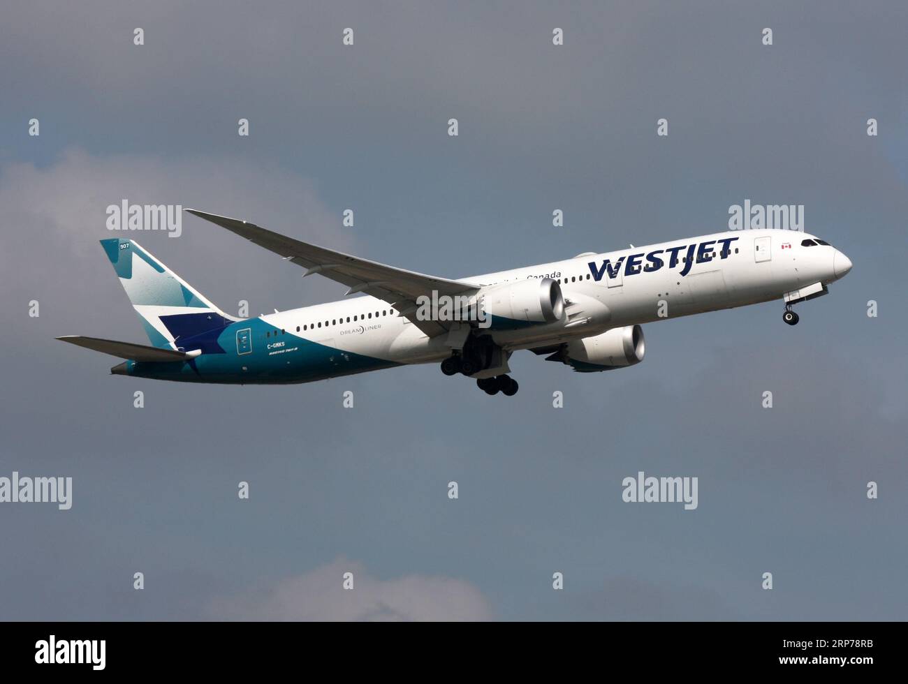 A Boeing 787-9 Dreamliner of Westjet departs London Gatwick Airport ...