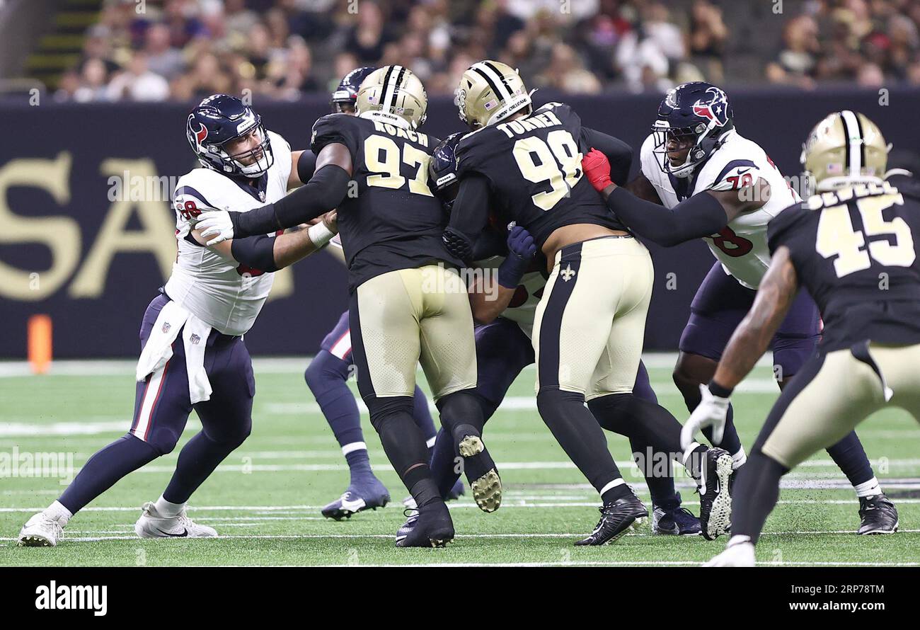 New Orleans, USA. 27th Aug, 2023. Houston Texans center Jarrett Patterson (68), center Michael Deiter (63) and offensive tackle Laremy Tunsil (78) engage with New Orleans Saints defensive ends Malcolm Roach (97) and Payton Turner (98) during a National Football League preseason game at the Caesars Superdome in New Orleans, Louisiana on Sunday, August 27, 2023. (Photo by Peter G. Forest/Sipa USA) Credit: Sipa USA/Alamy Live News Stock Photo