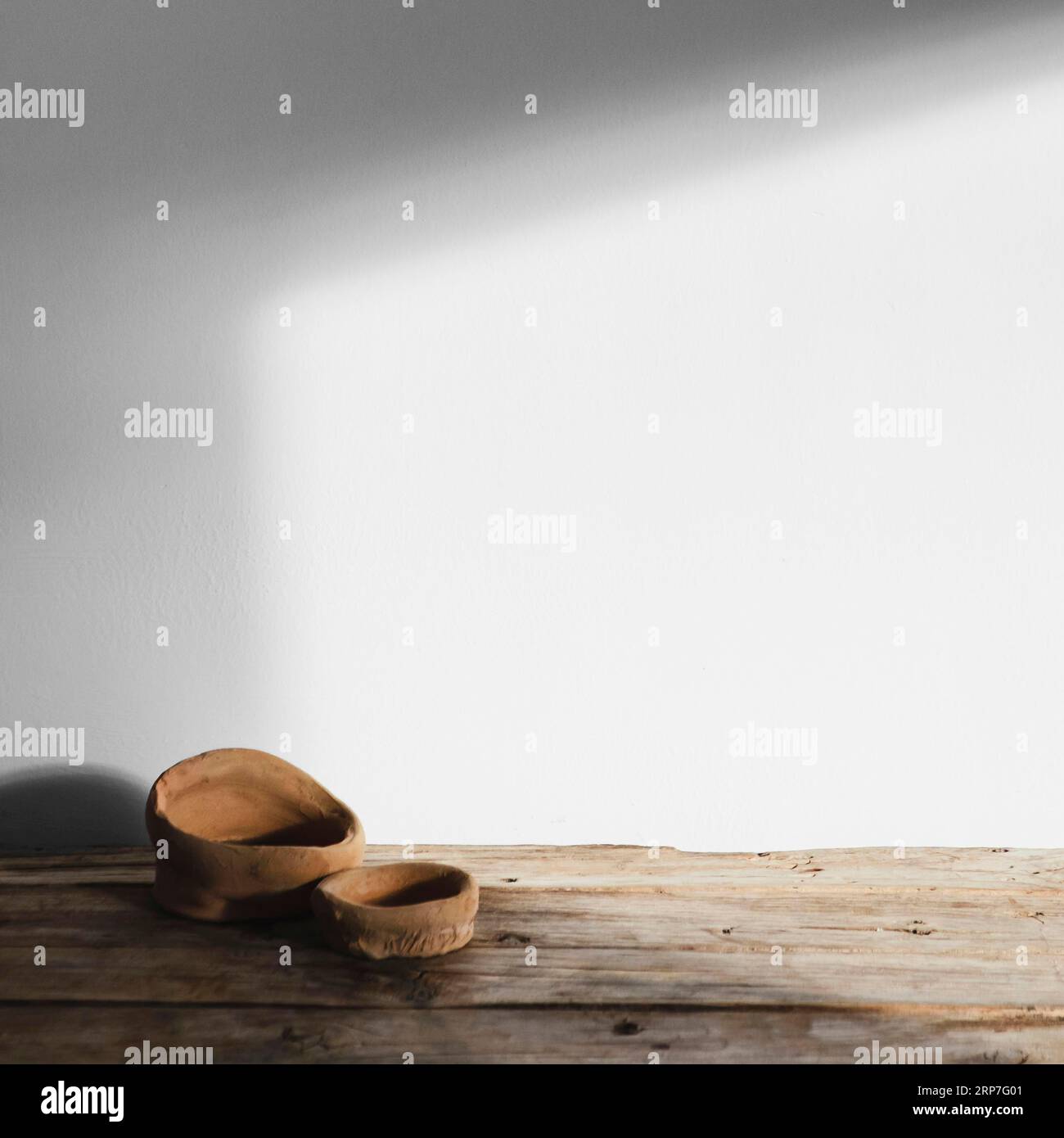 Abstract minimal concept objects shadows wooden table Stock Photo
