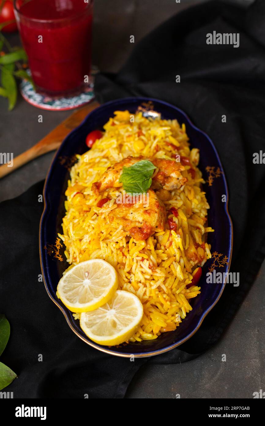 Chicken rice cooked indian style Stock Photo - Alamy