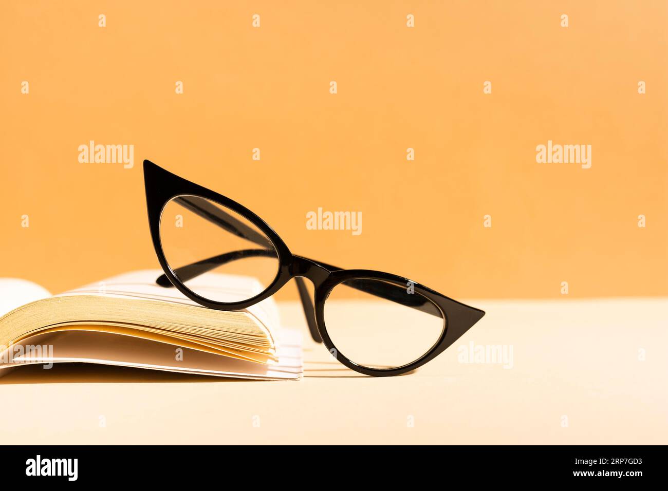 Retro glasses book Stock Photo Alamy