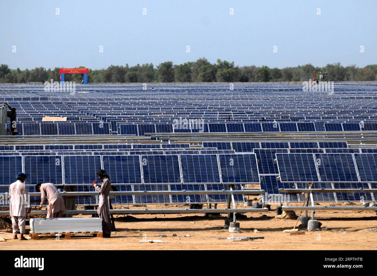(190207) -- BEIJING, Feb. 7, 2019 -- Workers install solar photovoltaic panels for the Zonergy 900 MW Solar Project in Bahawalpur, Pakistan, Aug. 28, 2015. Pakistani Prime Minister Imran Khan said on Wednesday that the China-Pakistan Economic Corridor (CPEC) will bring a host of economic opportunities for the country s southwest Balochistan province, local reports said. During his conversation with political representatives of the Balochistan Awami Party, the prime minister said that development of Gwadar port will open a new era of prosperity in Balochistan by creating vast opportunities for Stock Photo