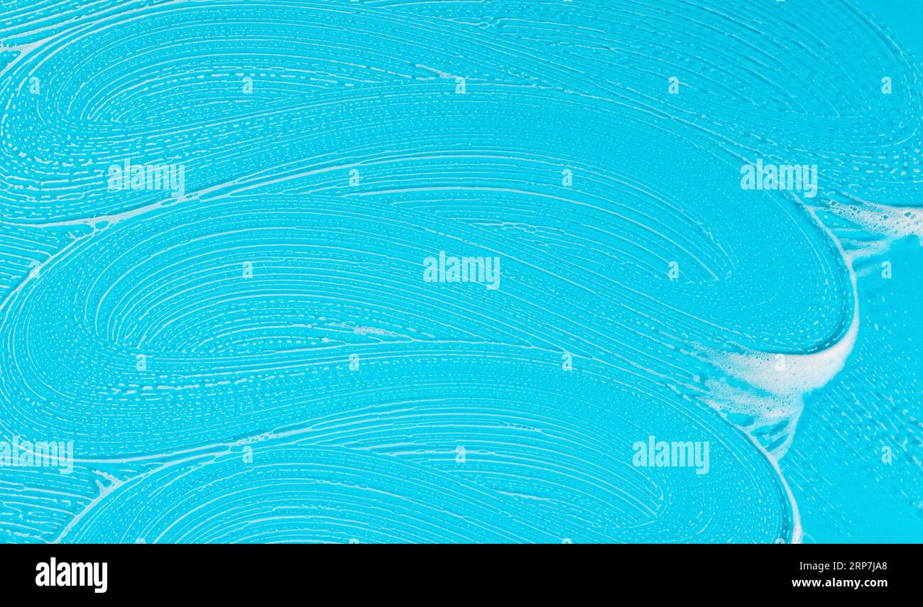 Flat lay soap foam blue background Stock Photo Alamy