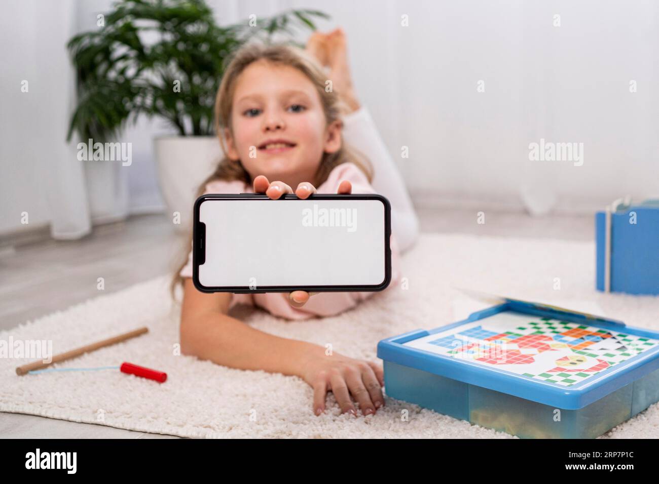 Non binary kid having fun home Stock Photo
