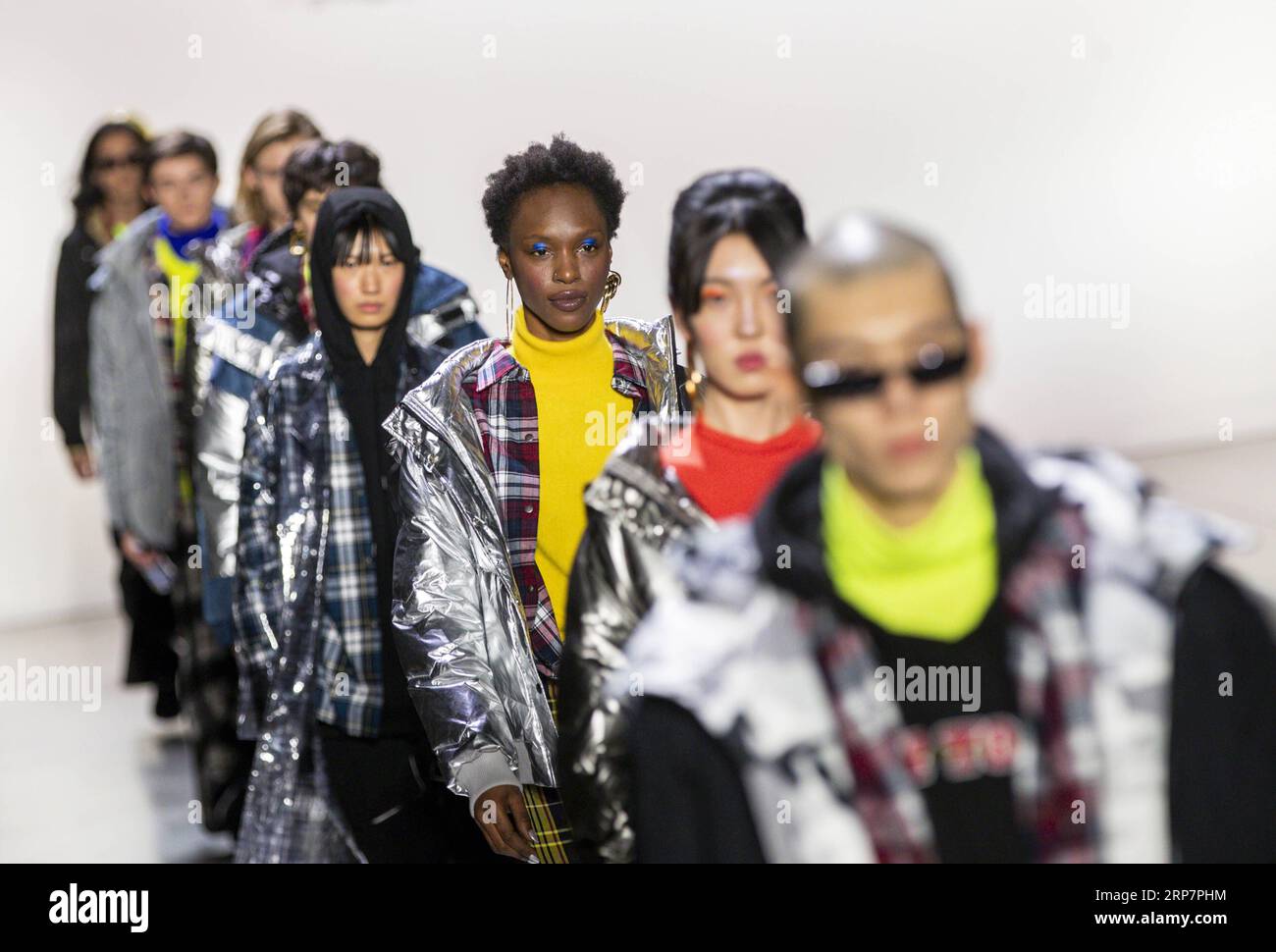 (190210) -- NEW YORK, Feb. 10, 2019 -- Models present creations at the PONY X HARBIN show during the New York Fashion Week in New York, the United States, Feb. 9, 2019. Popular Chinese brand Harbin Beer on Saturday put on an experimental show that blended traditional Chinese culture and American street art at the ongoing New York fashion week. The show started with a short music piece that was a fusion of Peking Opera and R&B, followed by a catwalk show debuting collection jointly presented by Harbin Beer and American sports brand PONY. ) U.S.-NEW YORK-FASHION SHOW WangxYing PUBLICATIONxNOTxIN Stock Photo