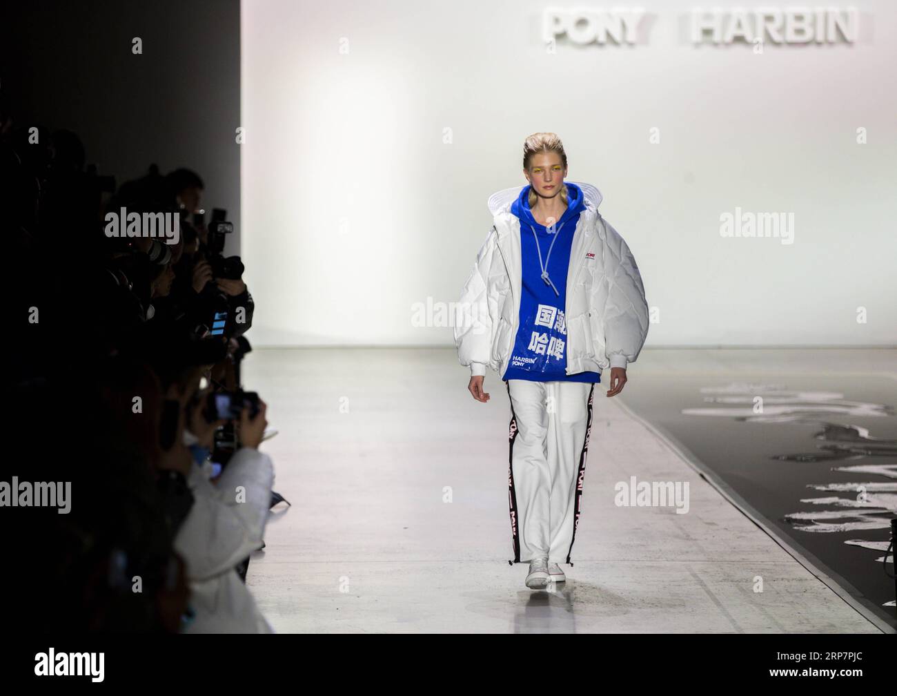 (190210) -- NEW YORK, Feb. 10, 2019 -- A model presents creations at the PONY X HARBIN show during the New York Fashion Week in New York, the United States, Feb. 9, 2019. Popular Chinese brand Harbin Beer on Saturday put on an experimental show that blended traditional Chinese culture and American street art at the ongoing New York fashion week. The show started with a short music piece that was a fusion of Peking Opera and R&B, followed by a catwalk show debuting collection jointly presented by Harbin Beer and American sports brand PONY. ) U.S.-NEW YORK-FASHION SHOW WangxYing PUBLICATIONxNOTx Stock Photo