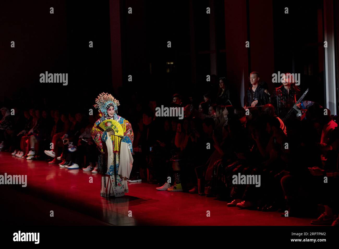 (190210) -- NEW YORK, Feb. 10, 2019 -- An artist performs at the PONY X HARBIN show during the New York Fashion Week in New York, the United States, Feb. 9, 2019. Popular Chinese brand Harbin Beer on Saturday put on an experimental show that blended traditional Chinese culture and American street art at the ongoing New York fashion week. The show started with a short music piece that was a fusion of Peking Opera and R&B, followed by a catwalk show debuting collection jointly presented by Harbin Beer and American sports brand PONY. ) U.S.-NEW YORK-FASHION SHOW WangxYing PUBLICATIONxNOTxINxCHN Stock Photo