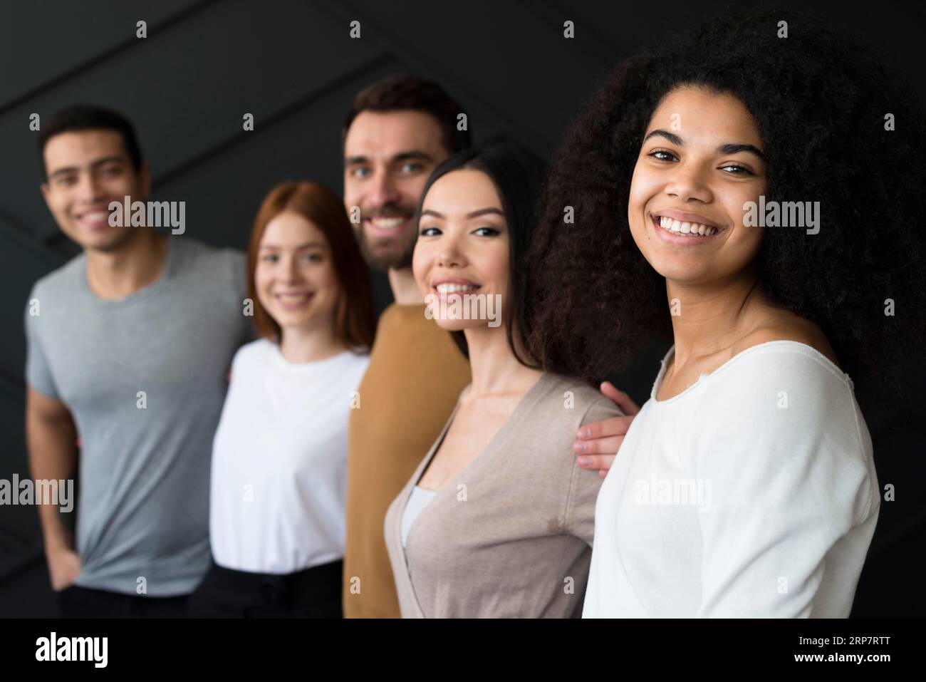 Front view positive young people smiling Stock Photo