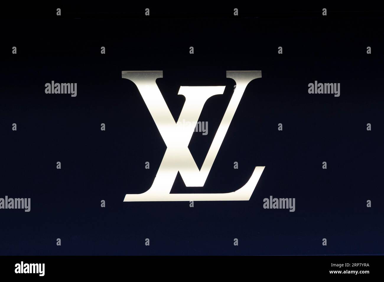Close-up, logo of the French luxury fashion brand Louis Vuitton on a ...