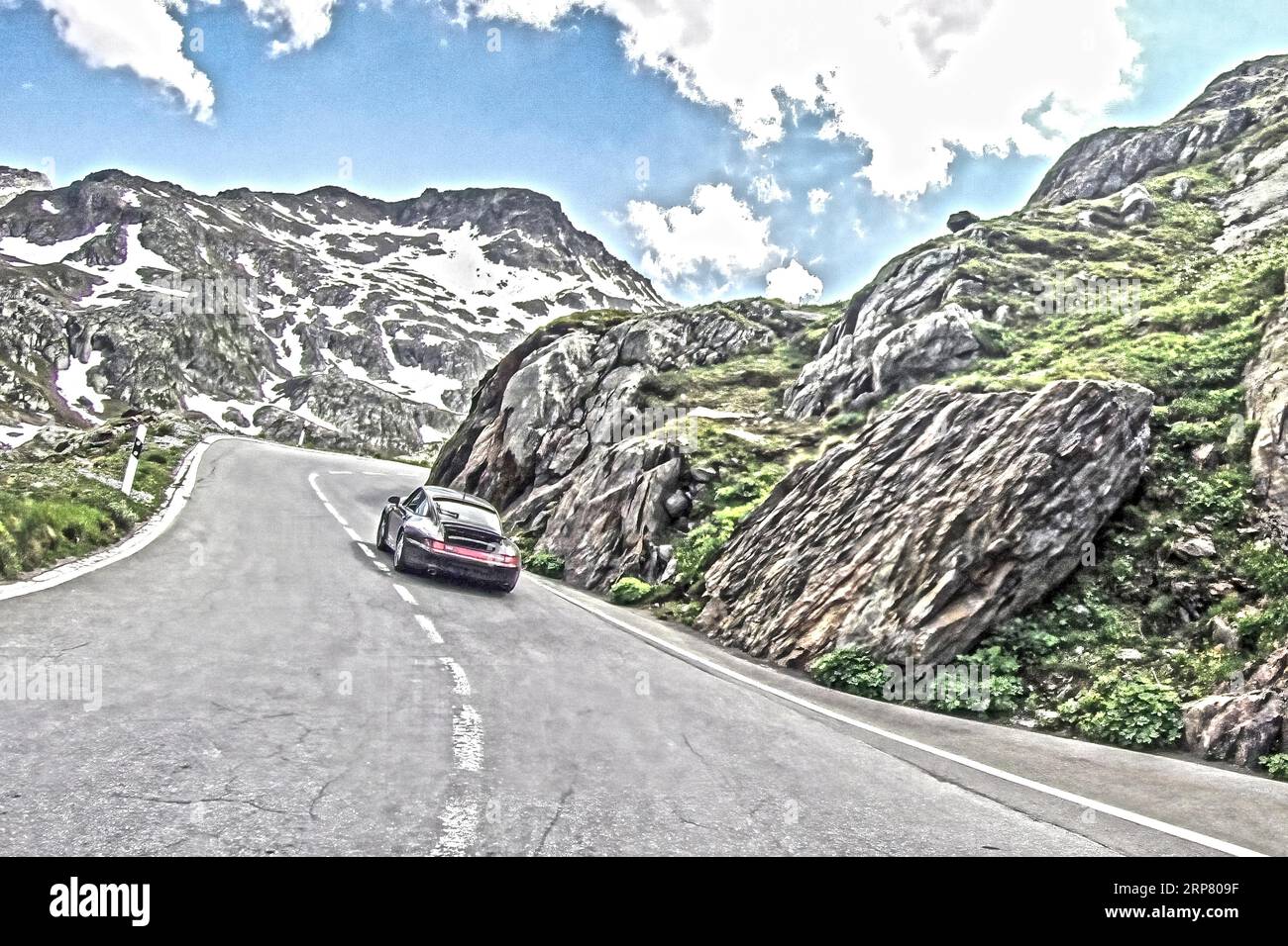 Photo with reduced dynamic saturation HDR of mountain pass alpine mountain road alpine road pass road pass Furkapass with serpentines, Swiss Alps Stock Photo