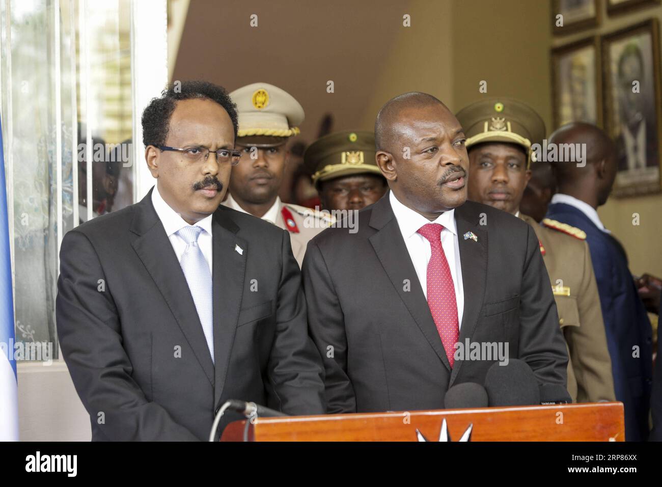 (190220) -- BUJUMBURA, Feb. 20, 2019 (Xinhua) -- Burundian President Pierre Nkurunziza (R) speaks at a joint press conference with visiting Somali President Mohamed Abdullahi Mohamed in Bujumbura, commercial capital of Burundi, Feb. 19, 2019. Nkurunziza on Tuesday disapproved the decision of the African Union (AU) to withdraw 1,000 Burundian peacekeepers from Somalia. The AU Peace and Security Council decided in December that Burundi should start the pullout of 1,000 Burundian troops of AU Mission in Somalia (AMISOM) before the end of February 2019, as part of reduction in AU troops in Somalia Stock Photo
