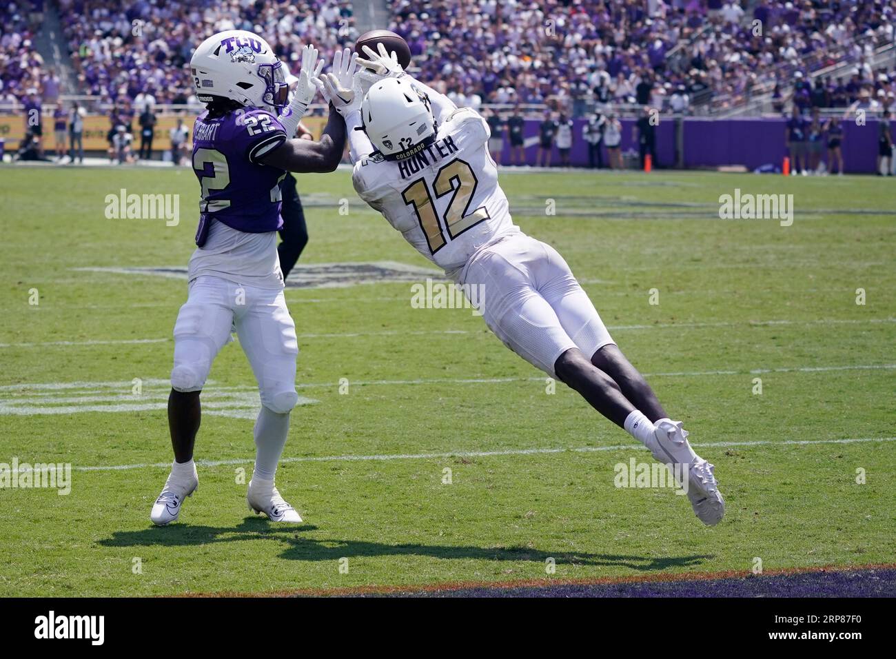Colorado cornerback Travis Hunter (12) jumps to intercept a pass
