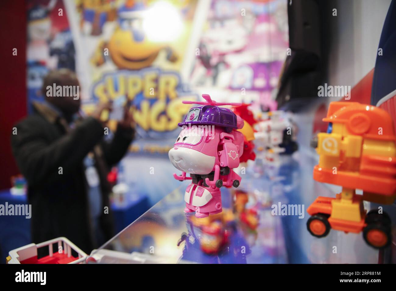 (190221) -- NEW YORK, Feb. 21, 2019 -- Cartoon characters of Super Wings is seen at the booth of Alpha Group Co., Ltd., a major animation, toy and entertainment player from Guangdong Province in southern China, during the 116th Annual North American International Toy Fair at the Jacob K. Javits Convention Center in New York, the United States, Feb. 19, 2019. Chinese toy manufacturers, which produce around 75 percent of global toys each year, are rising up the value chain from the original role as contract manufacturers to designers and makers of their own brands. ) U.S.-NEW YORK-CHINESE TOY PR Stock Photo
