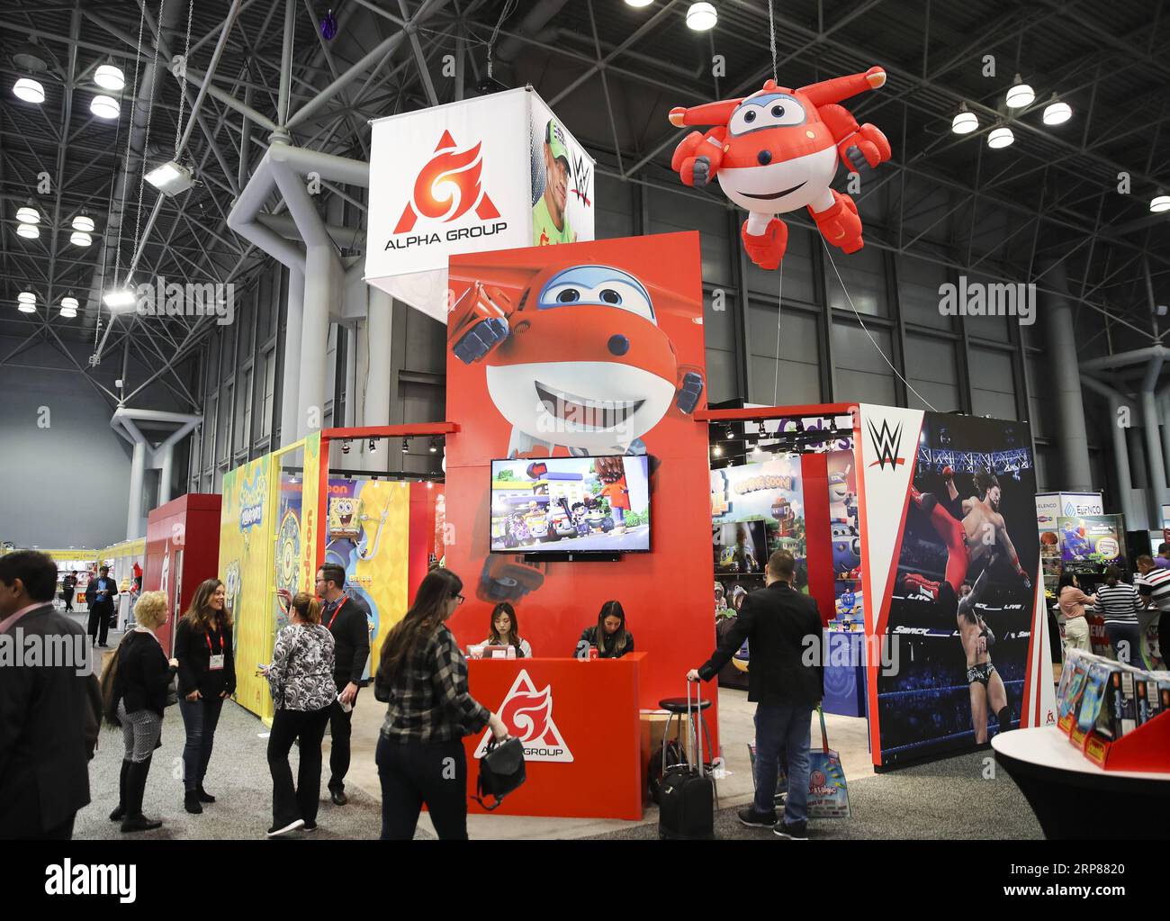 (190221) -- NEW YORK, Feb. 21, 2019 -- A cartoon character of Super Wings is seen at the booth of Alpha Group Co., Ltd., a major animation, toy and entertainment player from Guangdong Province in southern China, during the 116th Annual North American International Toy Fair at the Jacob K. Javits Convention Center in New York, the United States, Feb. 19, 2019. Chinese toy manufacturers, which produce around 75 percent of global toys each year, are rising up the value chain from the original role as contract manufacturers to designers and makers of their own brands. ) U.S.-NEW YORK-CHINESE TOY P Stock Photo