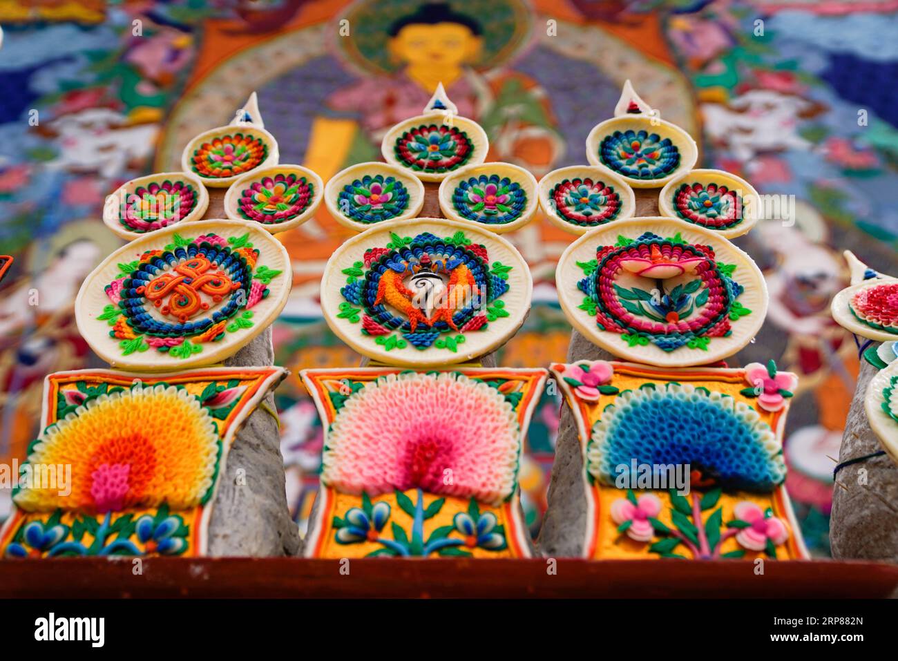 (190221) -- LHASA, Feb. 21, 2019 (Xinhua) -- Butter sculptures are displayed during a Cham dance ritual at the Qoide Monastery in Gonggar County of Shannan Prefecture, southwest China s Tibet Autonomous Region, Feb. 19, 2019. Dressed in colorful costumes, lamas danced to pounding drums at the Qoide Monastery during the Tibetan New Year celebrations. The Cham dance is a vibrant masked and costumed ritual performed by Tibetan Buddhist monks to exorcise evils and pray for blessings. The Qoide Monastery has a 500-year history of performing the Cham dance. The Cham dance here was listed as one of t Stock Photo