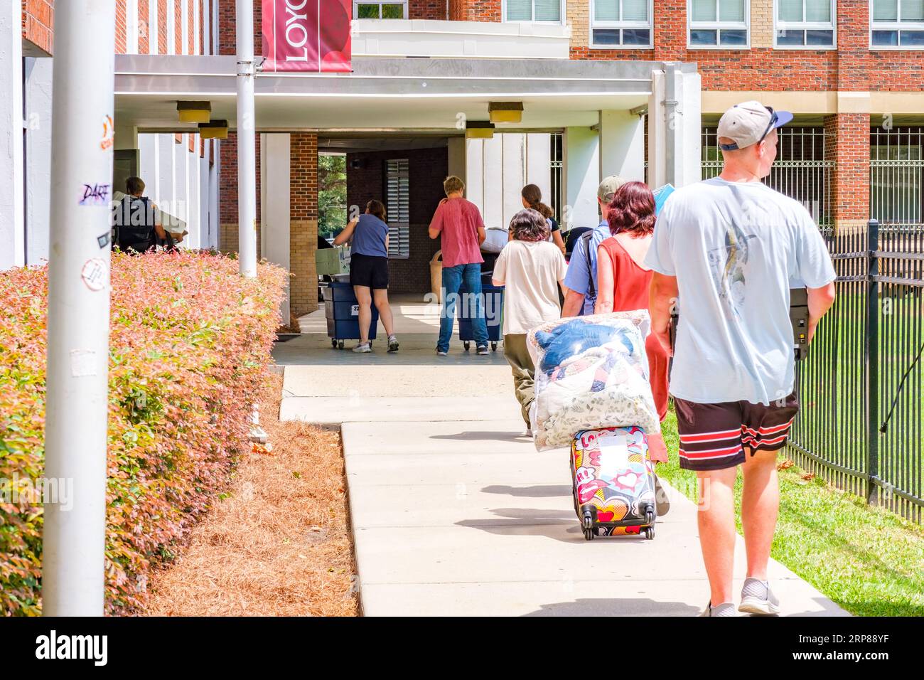 NEW ORLEANS, LA, USA - AUGUST 16, 2023: Parents and students moving into a dorm on the Loyola University campus for the fall semester Stock Photo
