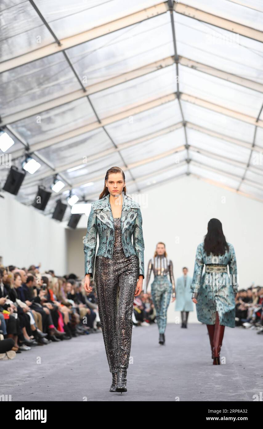 (190223) -- MILAN, Feb. 23, 2019 -- Models present creations for Roberto Cavalli during Milan Fashion Week Autumn/Winter 2019/2020 in Milan, Italy, Feb. 23, 2019. ) ITALY-MILAN-FASHION WEEK-ROBERTO CAVALLI ChengxTingting PUBLICATIONxNOTxINxCHN Stock Photo