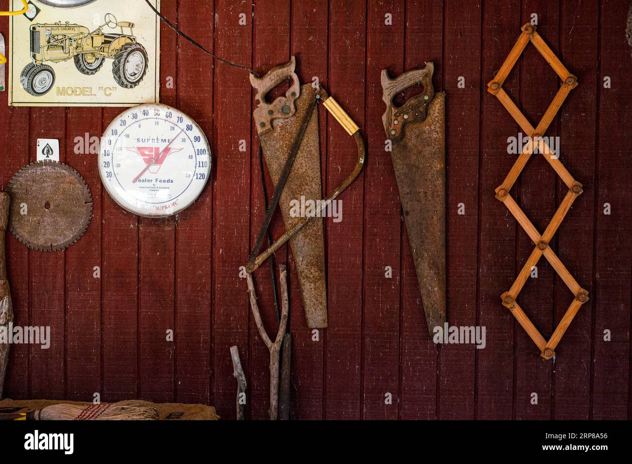 Items on a tool shed wall Stock Photo Alamy