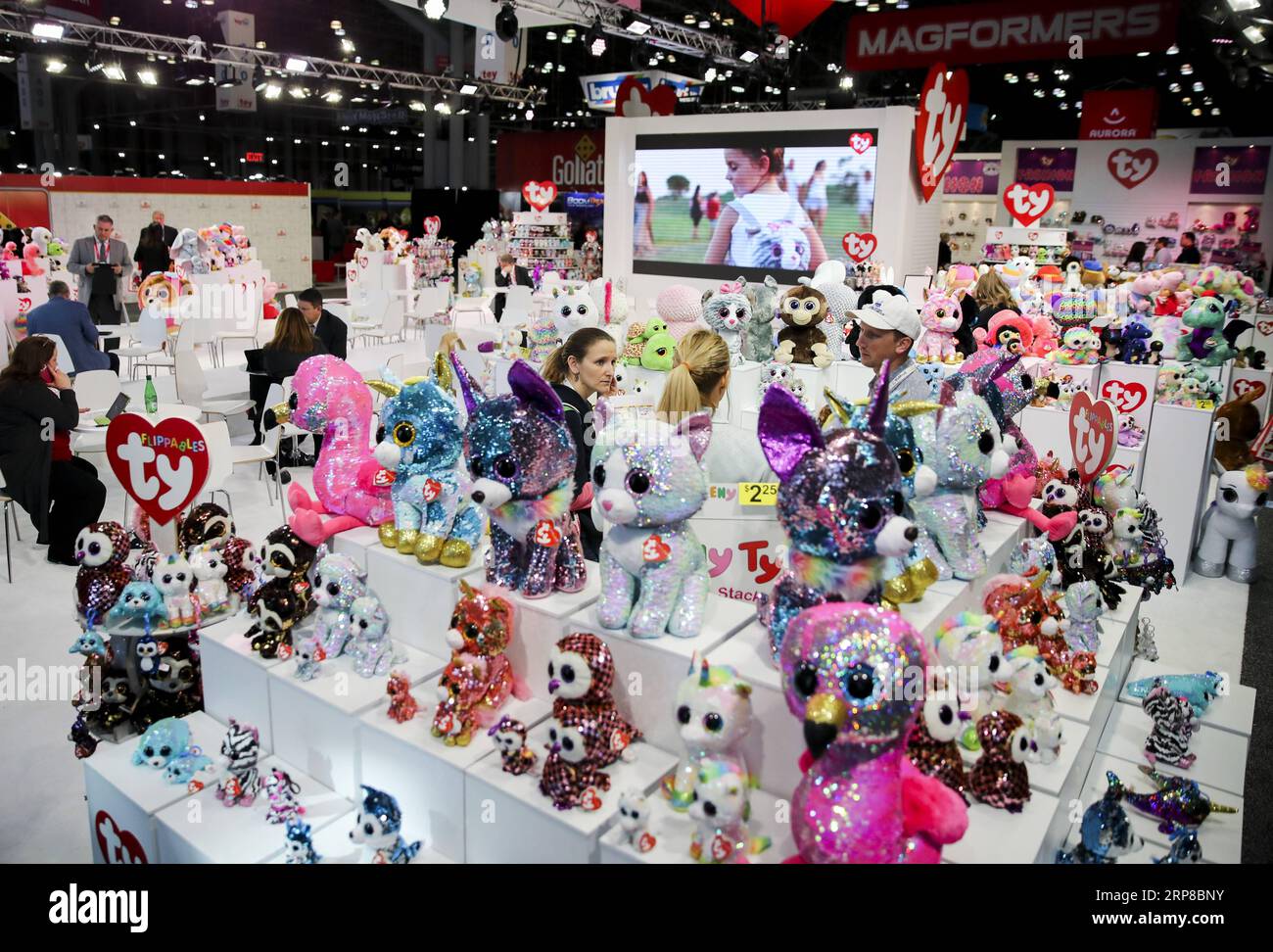 (190226) -- BEIJING, Feb. 26, 2019 -- Visitors look at stuffed toys at the booth of Ty Inc. during the 116th Annual North American International Toy Fair at the Jacob K. Javits Convention Center in New York, the United States, on Feb. 19, 2019. ) Xinhua headlines: More fun toys, no painful tariffs: American toymakers hopeful on U.S.-China trade deal WangxYing PUBLICATIONxNOTxINxCHN Stock Photo
