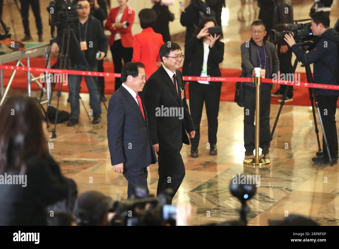 (190305) -- BEIJING, March 5, 2019 -- Chen Gang (R, front) and Li Dongsheng, deputies to the 13th National People s Congress (NPC), prepare to receive an interview before the opening meeting of the second session of the 13th NPC in Beijing, capital of China, March 5, 2019. ) (TWO SESSIONS)CHINA-BEIJING-NPC-DEPUTIES-INTERVIEW (CN) JinxLiwang PUBLICATIONxNOTxINxCHN Stock Photo