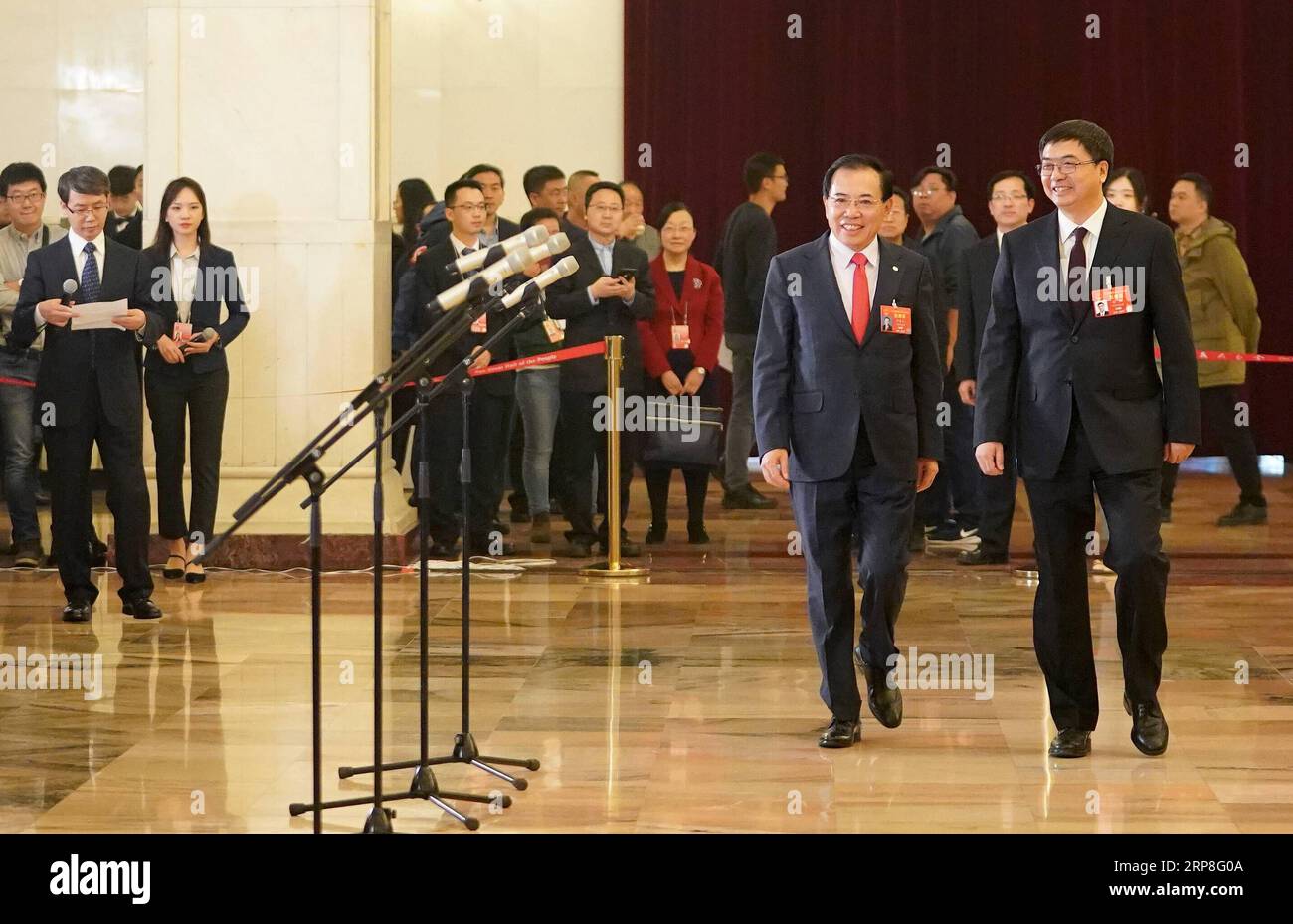 (190305) -- BEIJING, March 5, 2019 -- Chen Gang (R, front) and Li Dongsheng, deputies to the 13th National People s Congress (NPC), prepare to receive an interview before the opening meeting of the second session of the 13th NPC in Beijing, capital of China, March 5, 2019. ) (TWO SESSIONS)CHINA-BEIJING-NPC-DEPUTIES-INTERVIEW (CN) WangxYuguo PUBLICATIONxNOTxINxCHN Stock Photo